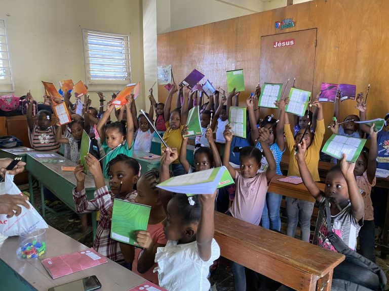 St-Francois-Xavier-Grade-1-students-with-note-book-and-pencil-Nov.-30-2022